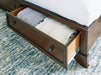 Trellington Sleigh Storage Bed - Golden Home Furniture 