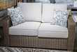 Laguna Heights Outdoor Loveseat with Cushion - Golden Home Furniture 