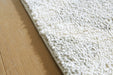 Unawick Large Rug - Golden Home Furniture 
