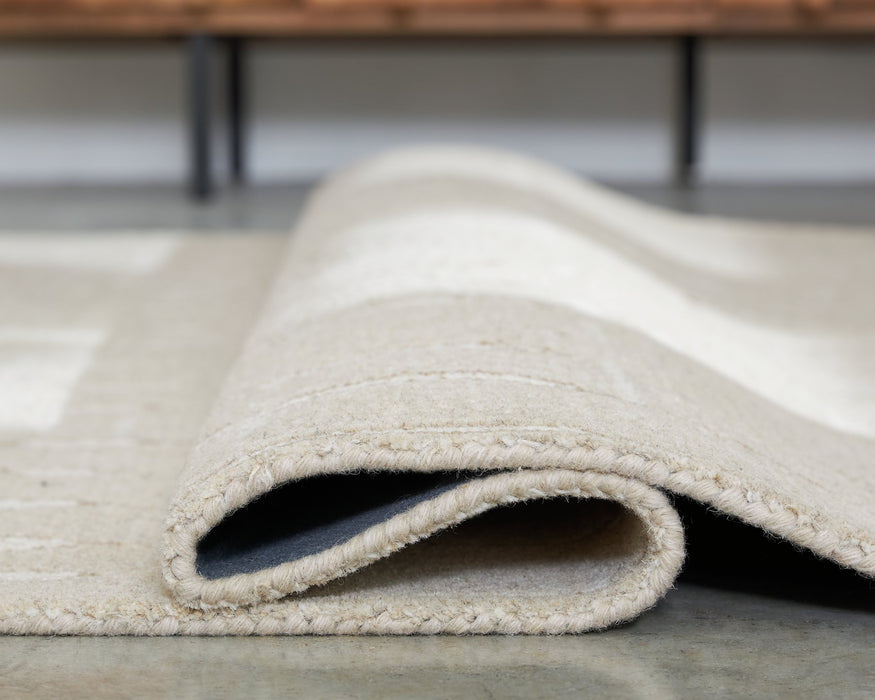 Wolbert 7'8" x 10' Area Rug - Golden Home Furniture 