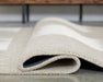 Wolbert 7'8" x 10' Area Rug - Golden Home Furniture 