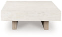 Jorlaina Coffee Table - Golden Home Furniture 