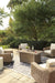 Beachcroft Beachcroft Fire Pit Table with Four Nuvella Swivel Lounge Chairs - Golden Home Furniture (Columbus, OH) - Multi Location